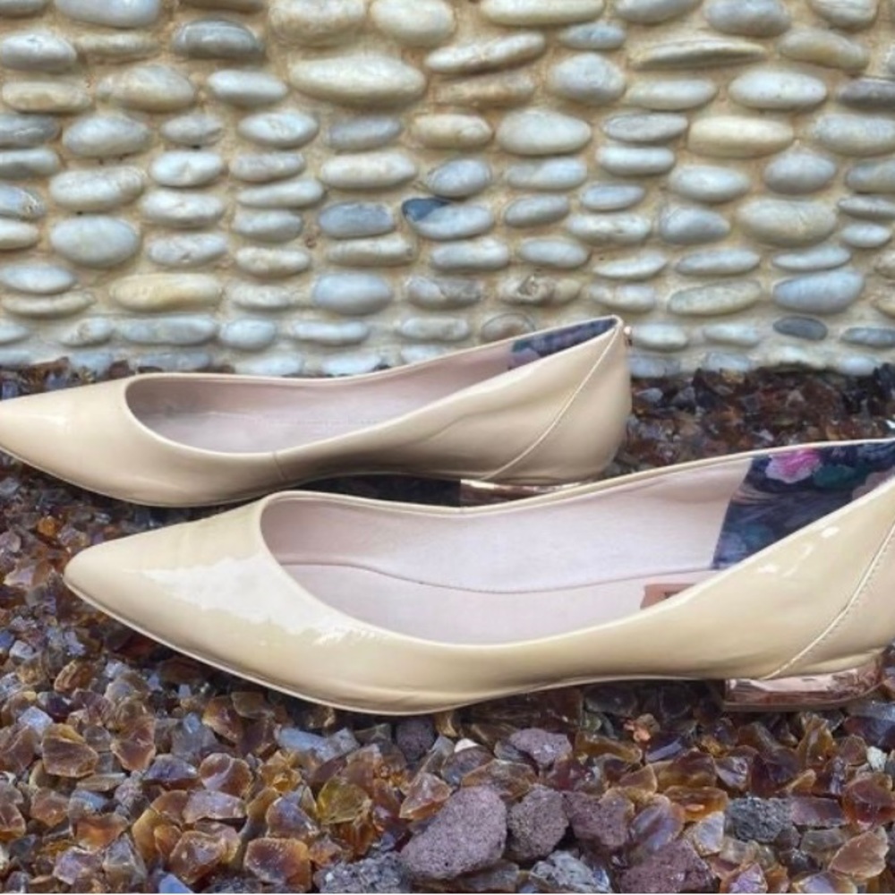 Cream patent leather Ted Baker flats.  Pointed toe with rose gold heal.